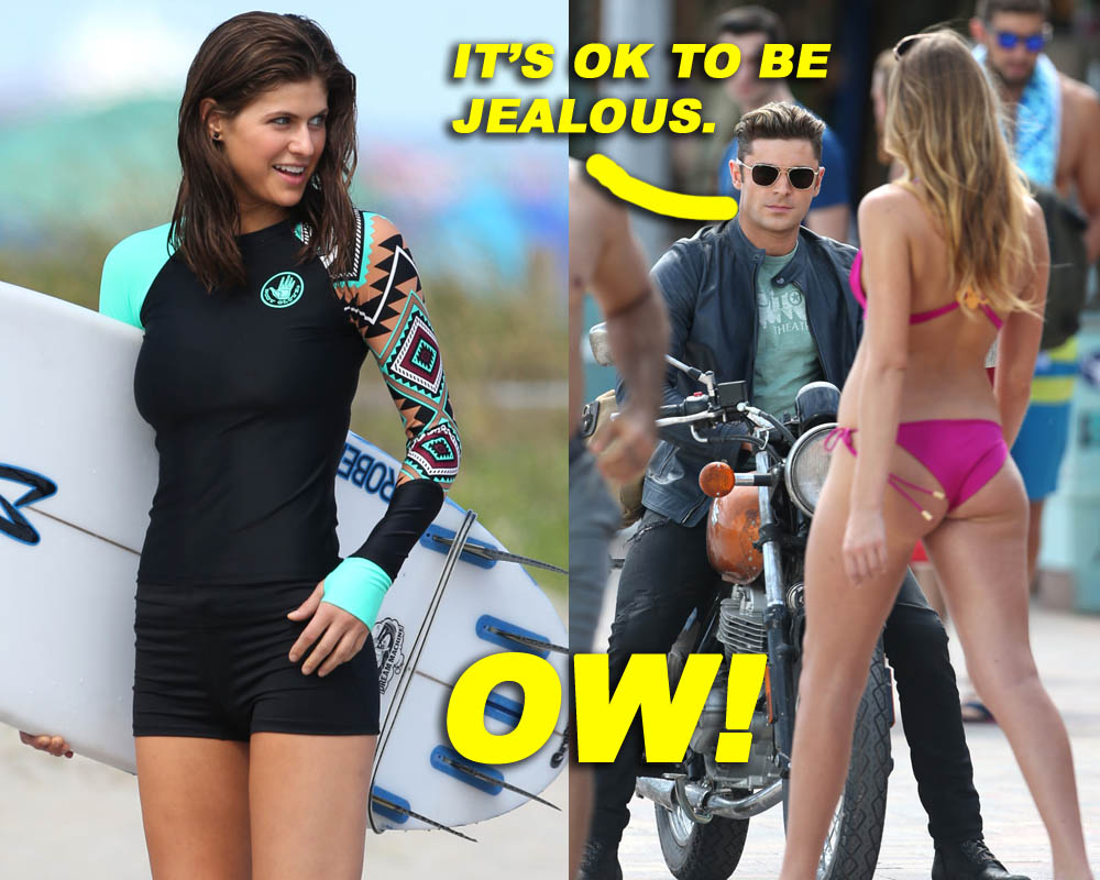 Zac Efron checks out some bikini clad beauties as he rides a motorcycle during a scene for 'Baywatch'
