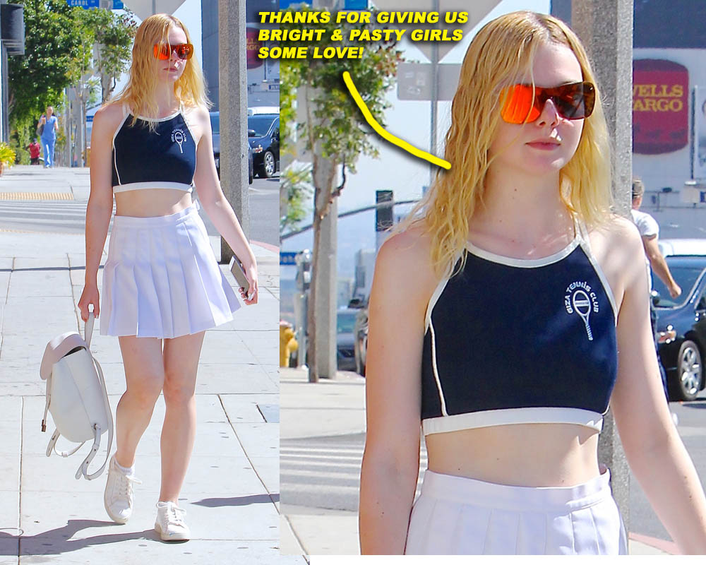 Elle Fanning looks ready for some tennis but forgets her sports bra as she was seen strolling through LA in a head turning outfit topped off with some futuristic looking orange mirrored lens sunglasses
